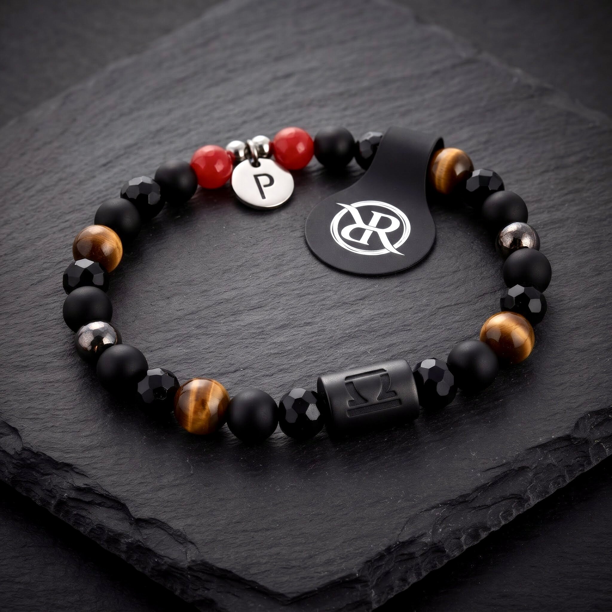 A bracelet made from natural stones featuring a zodiac sign and a letter of your choice