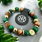 Bracelet made of natural semiprecious stones Jade and Tiger's Eye