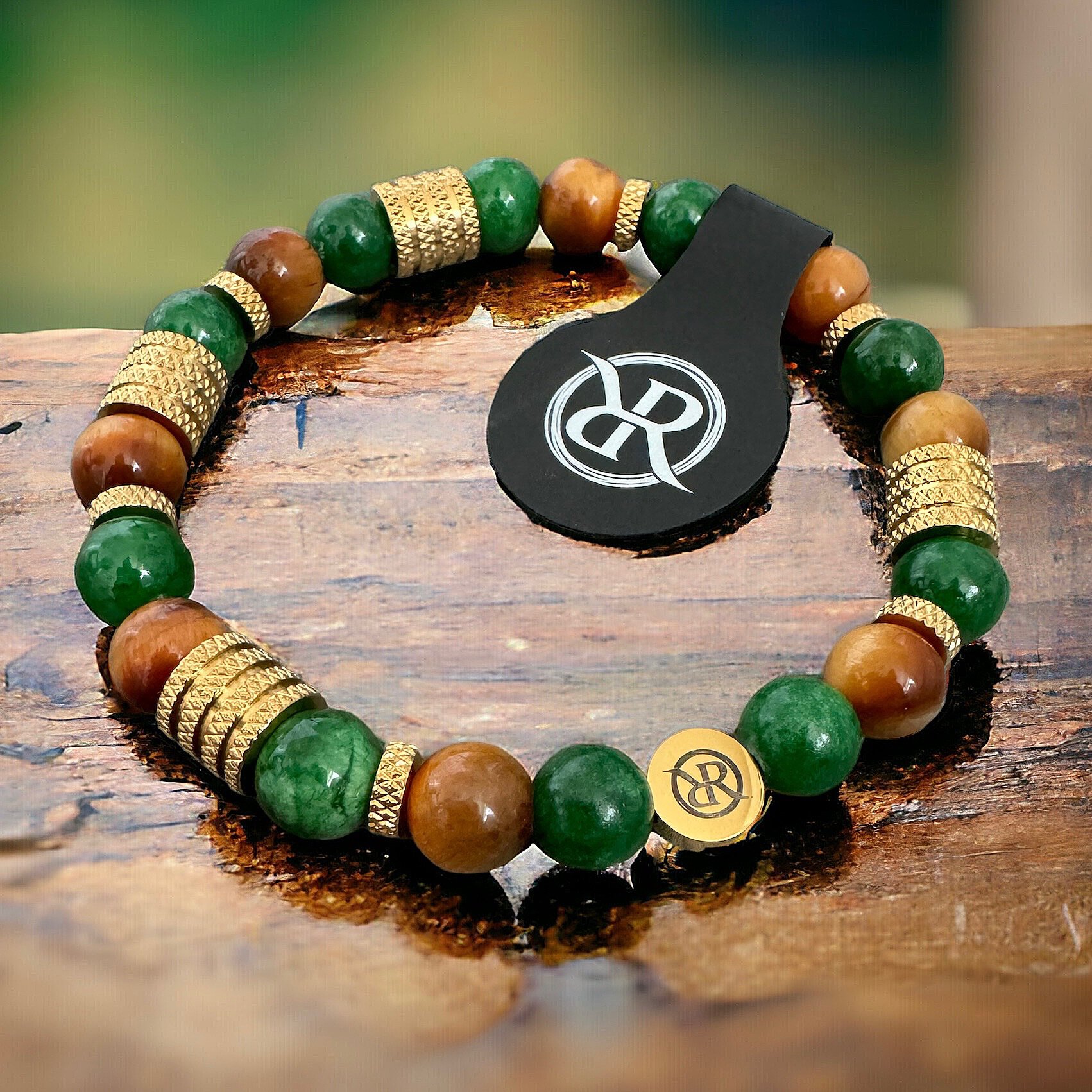 Bracelet made of natural semiprecious stones Jade and Tiger's Eye