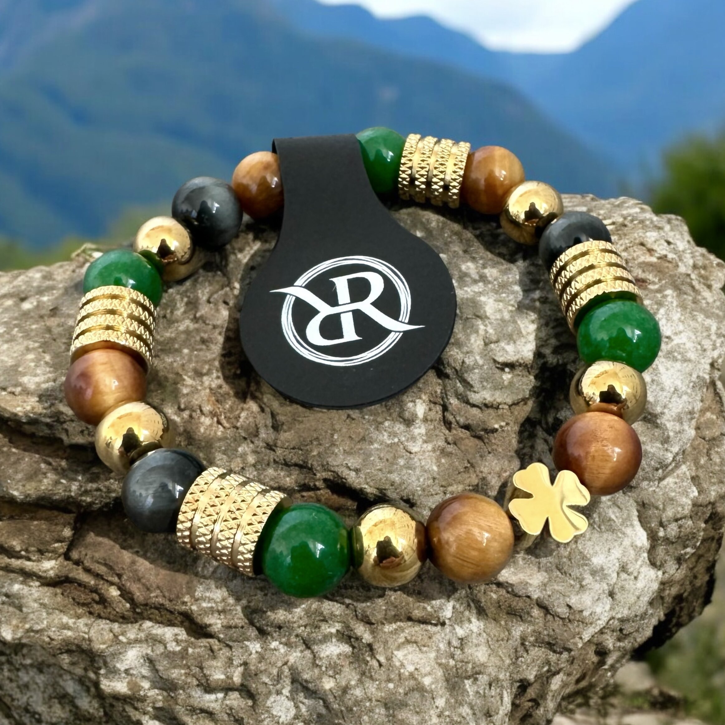 Bracelet with golden four-leaf clover