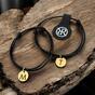 Two minimalist bracelets with gold lettering
