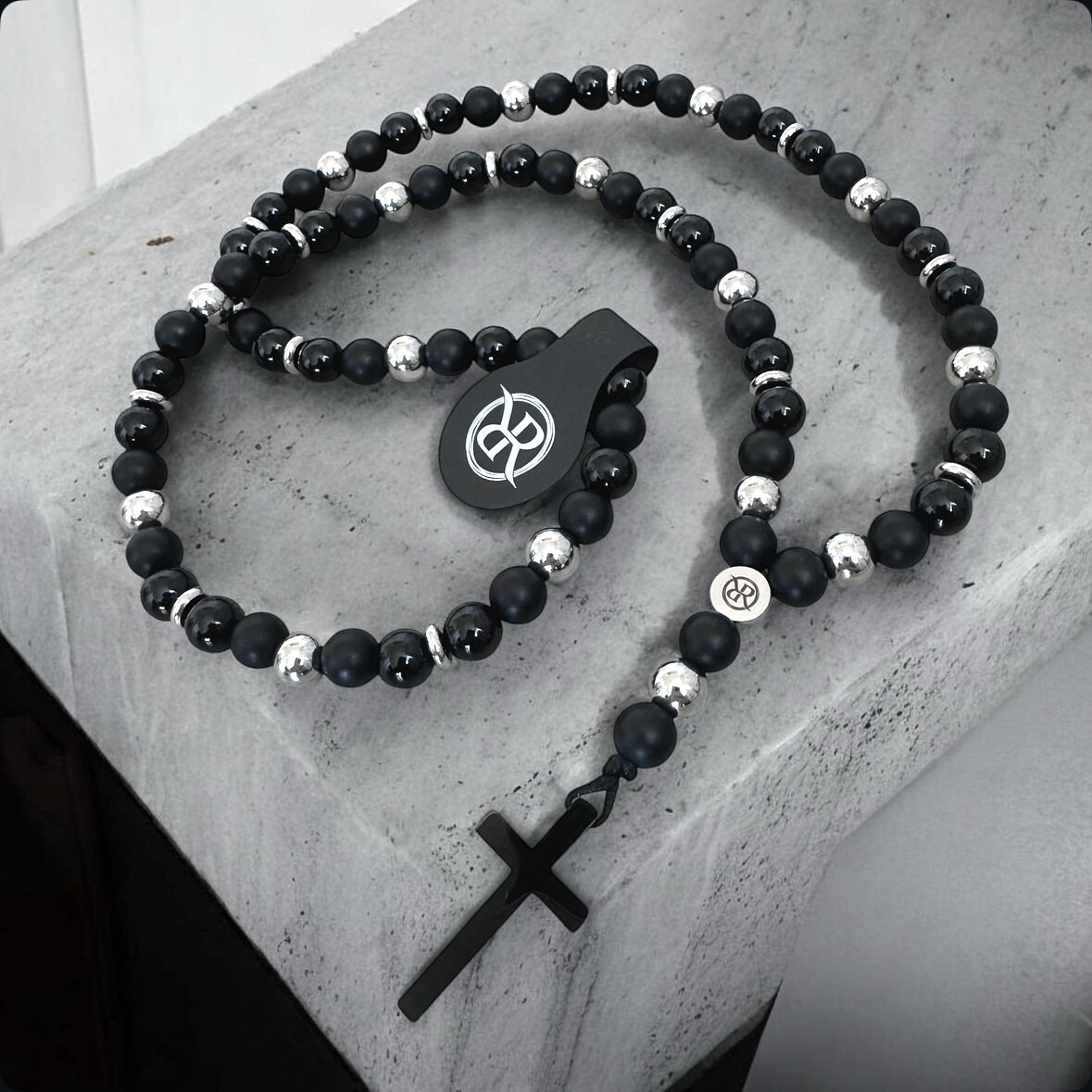 Necklace in the shape of a rosary made of natural stones