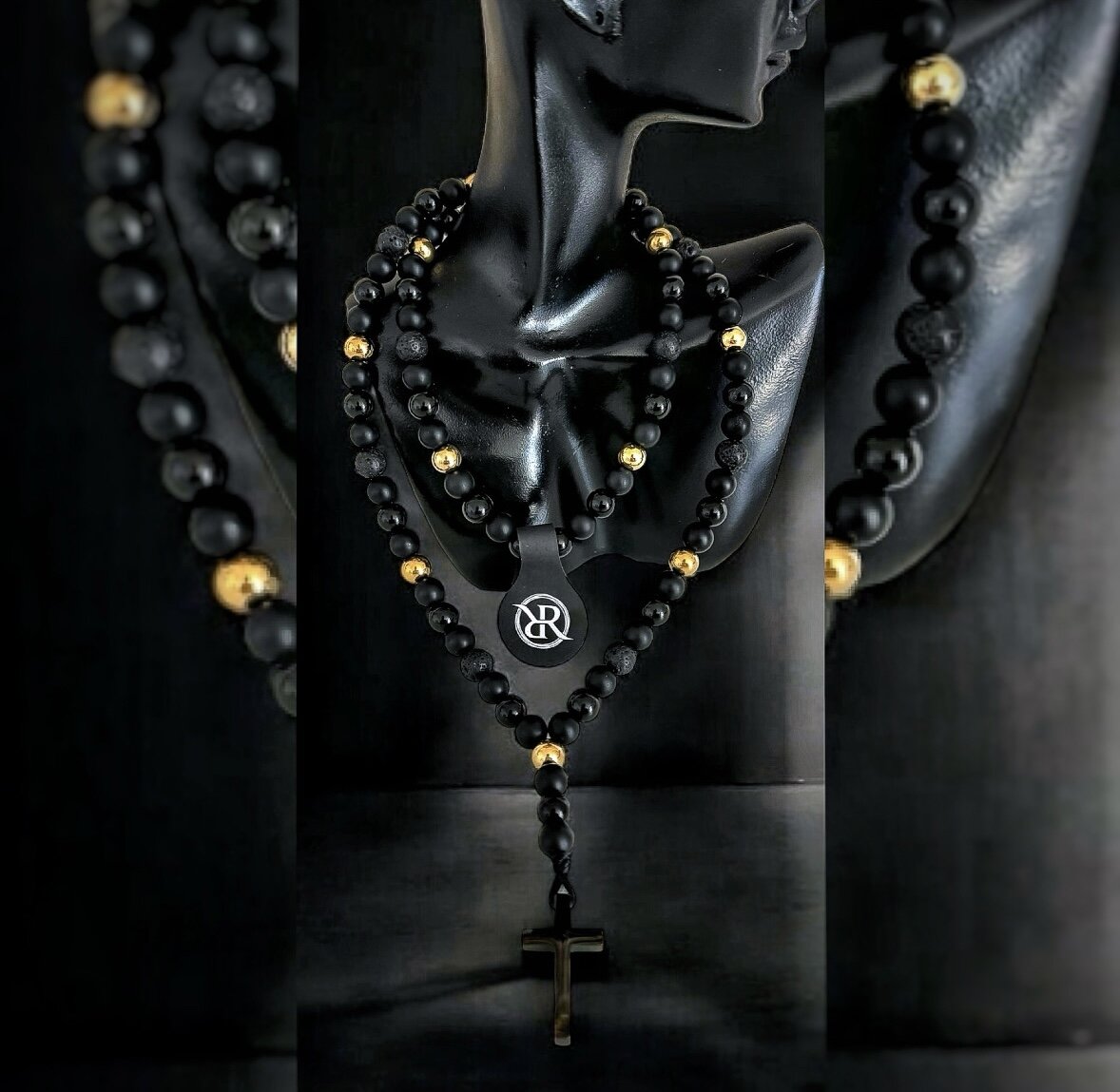 Necklace in the shape of a rosary made of natural stones with a black cross