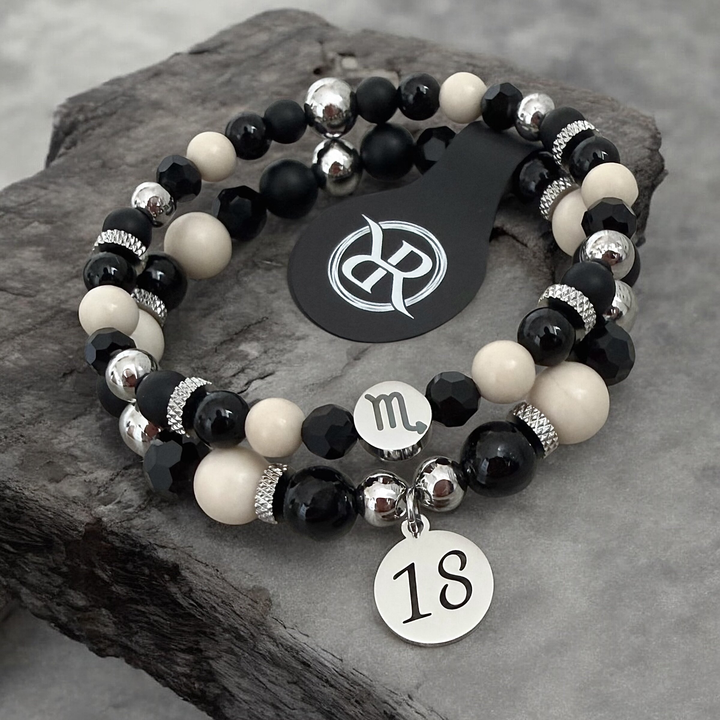 Set of two bracelets with zodiac sign and number 18